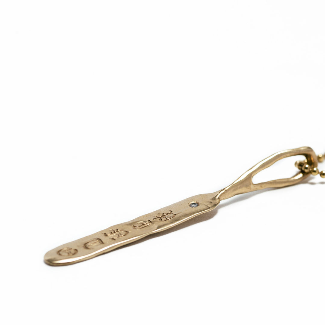 Elongated Oval ID Coin with Diamond